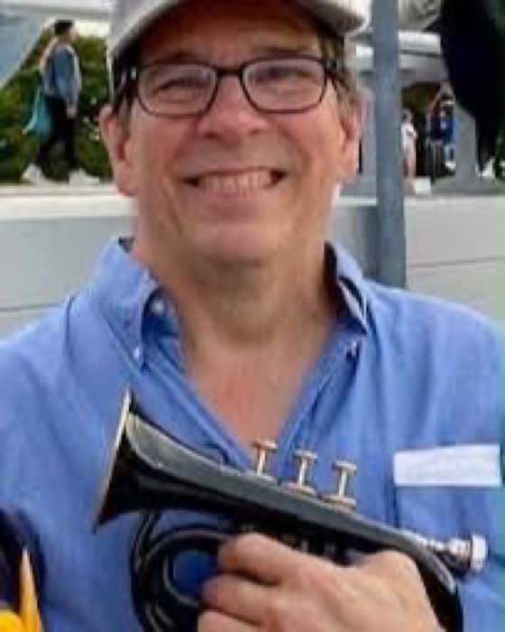 Dave Selley holding a trumpet